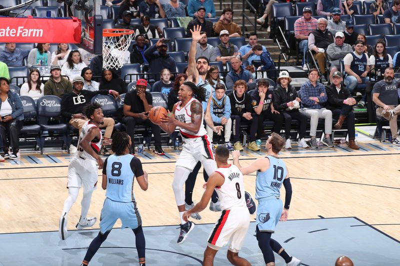 MEMPHIS, TN - MARCH 2: Jabari Walker #34 of the Portland Trail Blazers shoots the ball during the game against the Memphis Grizzlies on March 2, 2024 at FedExForum in Memphis, Tennessee. NOTE TO USER: User expressly acknowledges and agrees that, by downloading and or using this photograph, User is consenting to the terms and conditions of the Getty Images License Agreement. Mandatory Copyright Notice: Copyright 2024 NBAE (Photo by Joe Murphy/NBAE via Getty Images)