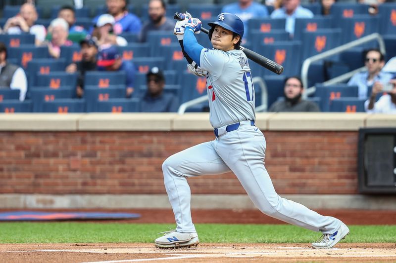 May 29, 2024; New York City, New York, USA;  Los Angeles Dodgers designated hitter Shohei Ohtani (17) hits a fly ball in the first inning against the New York Mets at Citi Field. Mandatory Credit: Wendell Cruz-USA TODAY Sports