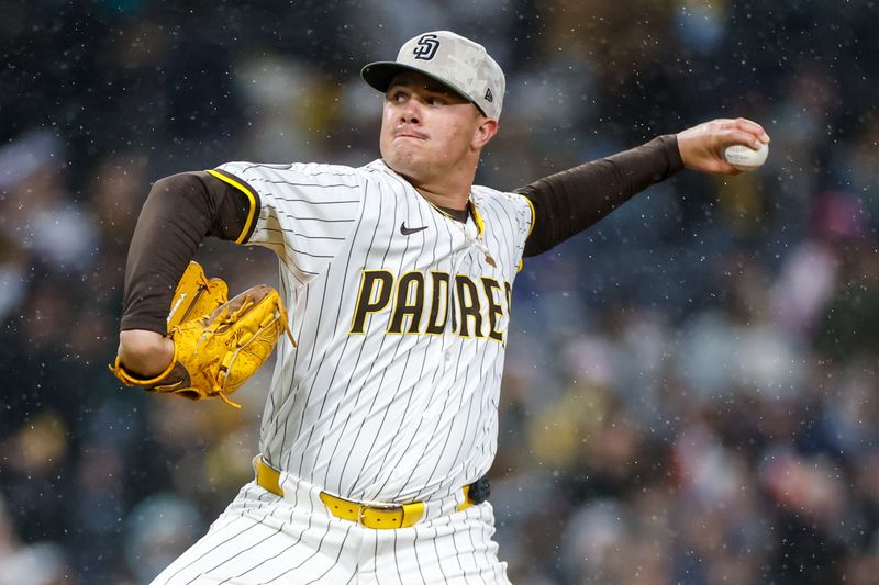 May 17, 2025; San Diego, California, USA; San Diego Padres relief pitcher Adrian Morejon (50) throws a pitch during the seventh inning against the Seattle Mariners at Petco Park. Mandatory Credit: David Frerker-Imagn Images