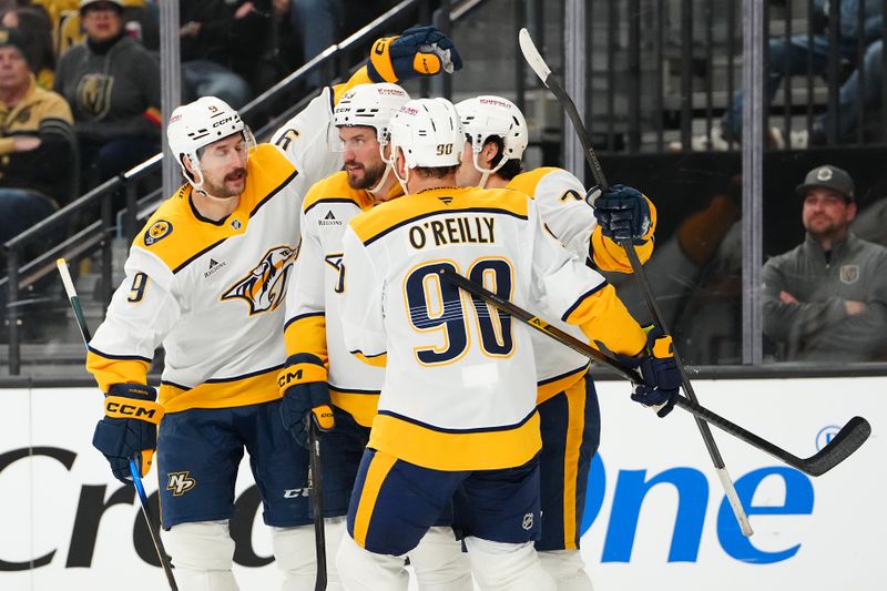 Jan 17, 2026; Las Vegas, Nevada, USA; Nashville Predators defenseman Roman Josi (59) celebrates with team mates after assisting on a goal scored against the Vegas Golden Knights by right wing Luke Evangelista (77) during the first period at T-Mobile Arena. Mandatory Credit: Stephen R. Sylvanie-Imagn Images
