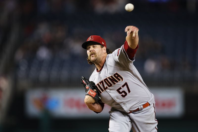 Jun 7, 2023; Washington, District of Columbia, USA; Arizona Diamondbacks relief pitcher Andrew Chafin (57) pitches against the Washington Nationals during the ninth inning at Nationals Park. Mandatory Credit: Scott Taetsch-USA TODAY Sports