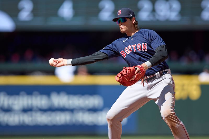 Aug 2, 2023; Seattle, Washington, USA; Boston Red Sox first baseman Triston Casas throws out Seattle Mariners Tom Murphy out during the eighth inning at T-Mobile Park. Mandatory Credit: John Froschauer-USA TODAY Sports