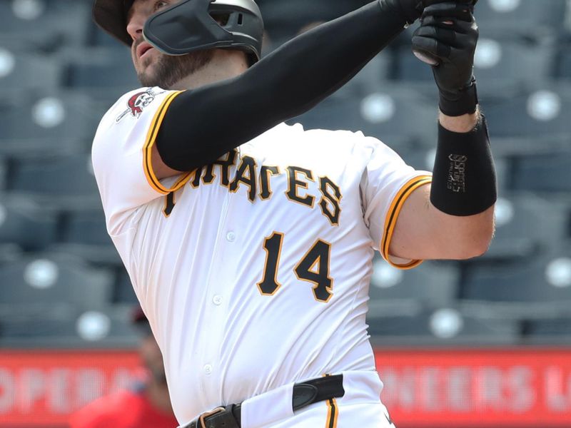 Apr 9, 2025; Pittsburgh, Pennsylvania, USA;  Pittsburgh Pirates catcher Joey Bart (14) hits a game winning walk off single to defeat the St. Louis Cardinals in the thirteenth inning at PNC Park. Mandatory Credit: Charles LeClaire-Imagn Images
