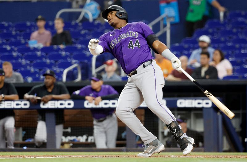 Apr 30, 2024; Miami, Florida, USA;  Colorado Rockies first baseman Elehuris Montero (44)follows through on his home run against the Miami Marlins in the first inning at loanDepot Park. Mandatory Credit: Rhona Wise-USA TODAY Sports