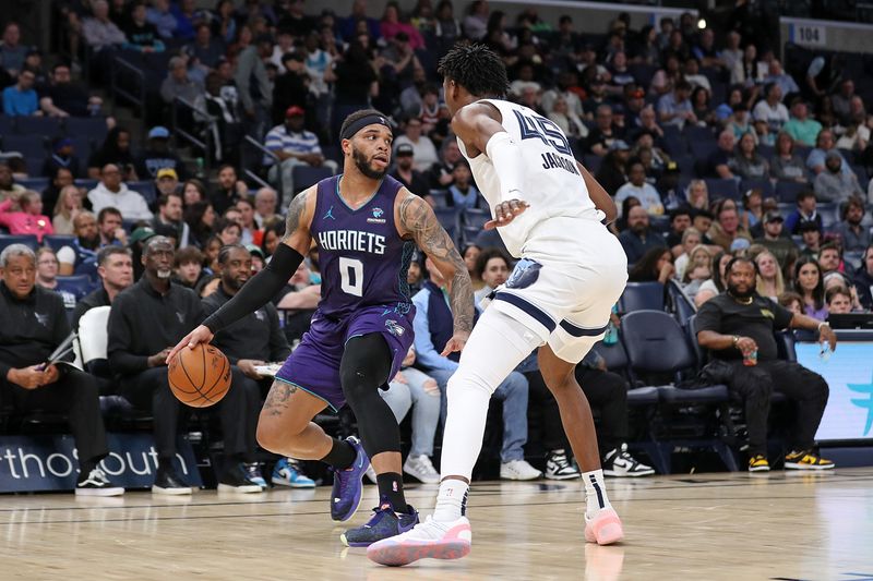 MEMPHIS, TENNESSEE - MARCH 13: Miles Bridges #0 of the Charlotte Hornets handles the ball against GG Jackson #45 of the Memphis Grizzlies during the second half at FedExForum on March 13, 2024 in Memphis, Tennessee. NOTE TO USER: User expressly acknowledges and agrees that, by downloading and or using this photograph, User is consenting to the terms and conditions of the Getty Images License Agreement. (Photo by Justin Ford/Getty Images)