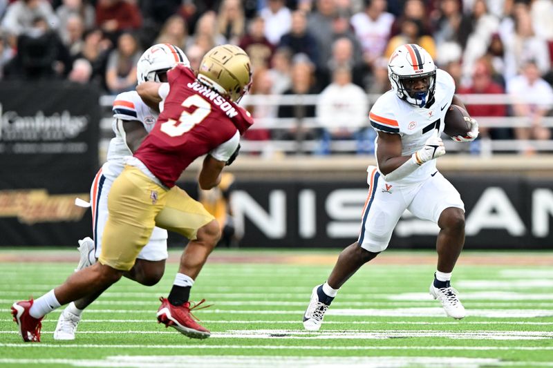 Sep 30, 2023; Chestnut Hill, Massachusetts, USA; Virginia Cavaliers running back Mike Hollins (7) rushes against Boston College Eagles defensive back Khari Johnson (3) during the first half at Alumni Stadium. Mandatory Credit: Brian Fluharty-USA TODAY Sports