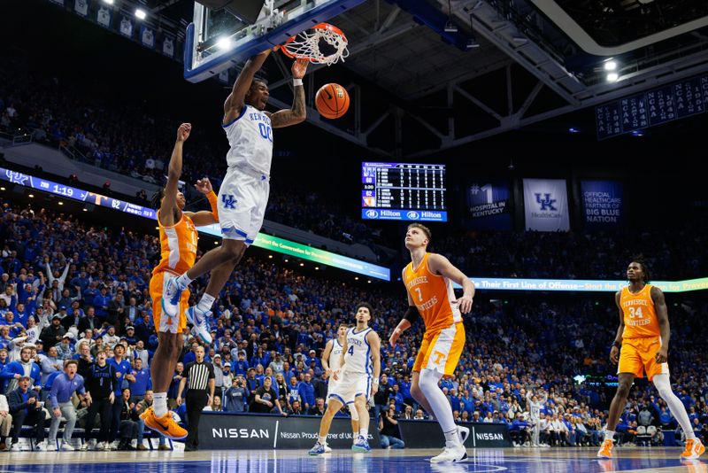 Feb 11, 2025; Lexington, Kentucky, USA; Kentucky Wildcats guard Otega Oweh (00) dunks the ball during the second half against the Tennessee Volunteers at Rupp Arena at Central Bank Center. Mandatory Credit: Jordan Prather-Imagn Images