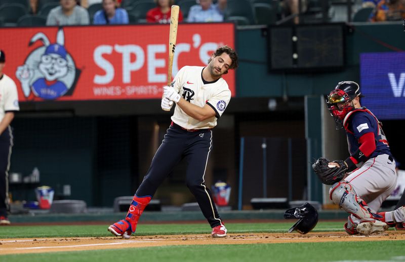 Aug 2, 2024; Arlington, Texas, USA; Texas Rangers designated hitter Josh Smith (8) loses his helmet while striking out during the first inning against the Boston Red Sox at Globe Life Field. Mandatory Credit: Kevin Jairaj-USA TODAY Sports