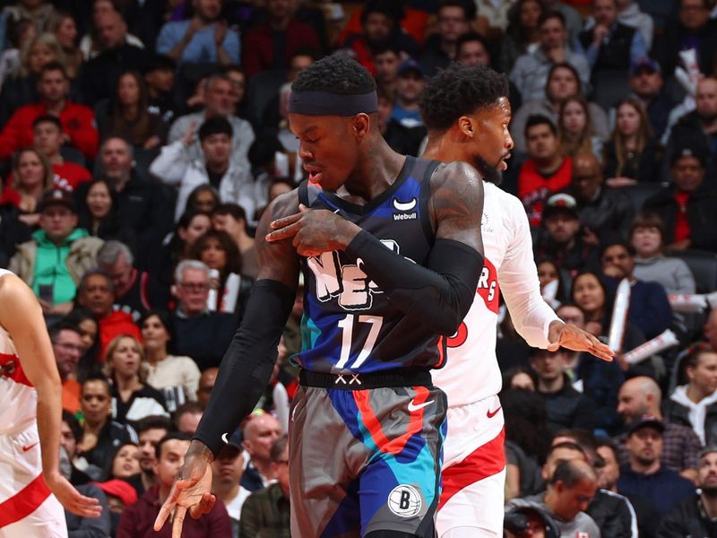 TORONTO, CANADA - MARCH 25: Dennis Schroder #17 of the Brooklyn Nets celebrates three point basket during the game against the Toronto Raptors on March 25, 2024 at the Scotiabank Arena in Toronto, Ontario, Canada.  NOTE TO USER: User expressly acknowledges and agrees that, by downloading and or using this Photograph, user is consenting to the terms and conditions of the Getty Images License Agreement.  Mandatory Copyright Notice: Copyright 2024 NBAE (Photo by Vaughn Ridley/NBAE via Getty Images)