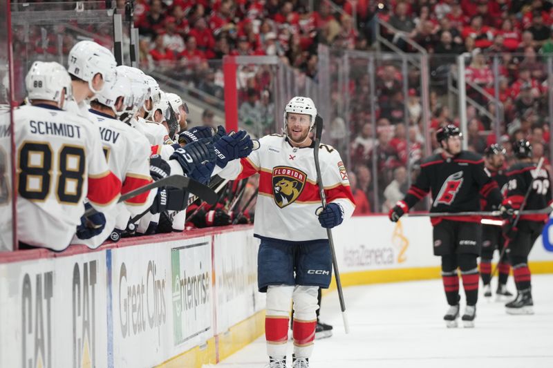 May 20, 2025; Raleigh, North Carolina, USA; Florida Panthers forward Carter Verhaeghe (23) celebrates scoring against the Carolina Hurricanes during the during the first period in game one of the Eastern Conference Final of the 2025 Stanley Cup Playoffs at Lenovo Center. Mandatory Credit: James Guillory-Imagn Images