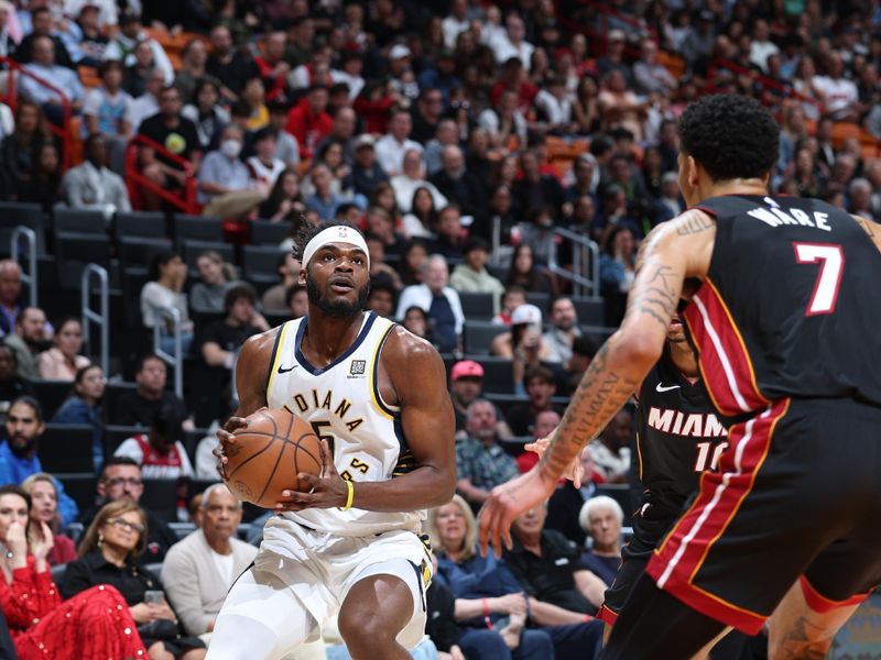 MIAMI, FL - JANUARY 02: Jarace Walker #5 of the Indiana Pacers handles the ball during the game against the Miami Heat on January 02, 2024 at Kaseya Center in Miami, Florida. NOTE TO USER: User expressly acknowledges and agrees that, by downloading and or using this Photograph, user is consenting to the terms and conditions of the Getty Images License Agreement. Mandatory Copyright Notice: Copyright 2024 NBAE (Photo by Jeff Haynes/NBAE via Getty Images)