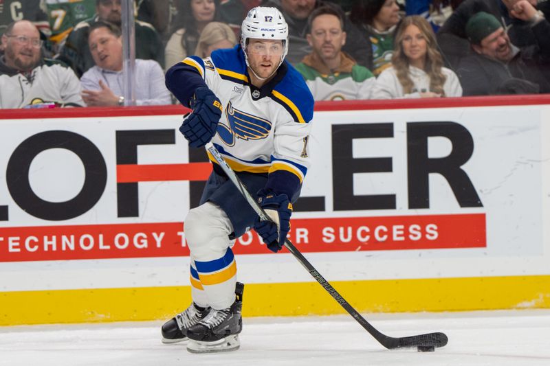 Jan 7, 2025; Saint Paul, Minnesota, USA; St. Louis Blues defenseman Cam Fowler (17) skates with the puck against the Minnesota Wild in the second period at Xcel Energy Center. Mandatory Credit: Matt Blewett-Imagn Images