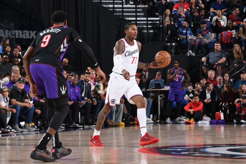 INGLEWOOD, CA - NOVEMBER 9: Kevin Porter Jr. #77 of the LA Clippers dribbles the ball during the game against the Toronto Raptors on November 9, 2024 at Intuit Dome in Los Angeles, California. NOTE TO USER: User expressly acknowledges and agrees that, by downloading and/or using this Photograph, user is consenting to the terms and conditions of the Getty Images License Agreement. Mandatory Copyright Notice: Copyright 2024 NBAE (Photo by Noah Graham/NBAE via Getty Images)