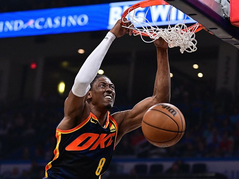 OKLAHOMA CITY, OKLAHOMA - APRIL 14: Jalen Williams #8 of the Oklahoma City Thunder goes up for a dunk during the first half against the Dallas Mavericks at Paycom Center on April 14, 2024 in Oklahoma City, Oklahoma. NOTE TO USER: User expressly acknowledges and agrees that, by downloading and or using this Photograph, user is consenting to the terms and conditions of the Getty Images License Agreement. (Photo by Joshua Gateley/Getty Images)