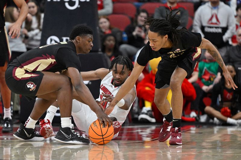 Feb 4, 2023; Louisville, Kentucky, USA;  Florida State Seminoles guard Chandler Jackson (0) and guard Caleb Mills (4) scramble for a loose ball with Louisville Cardinals forward Jae'Lyn Withers (24) during the first half at KFC Yum! Center. Mandatory Credit: Jamie Rhodes-USA TODAY Sports