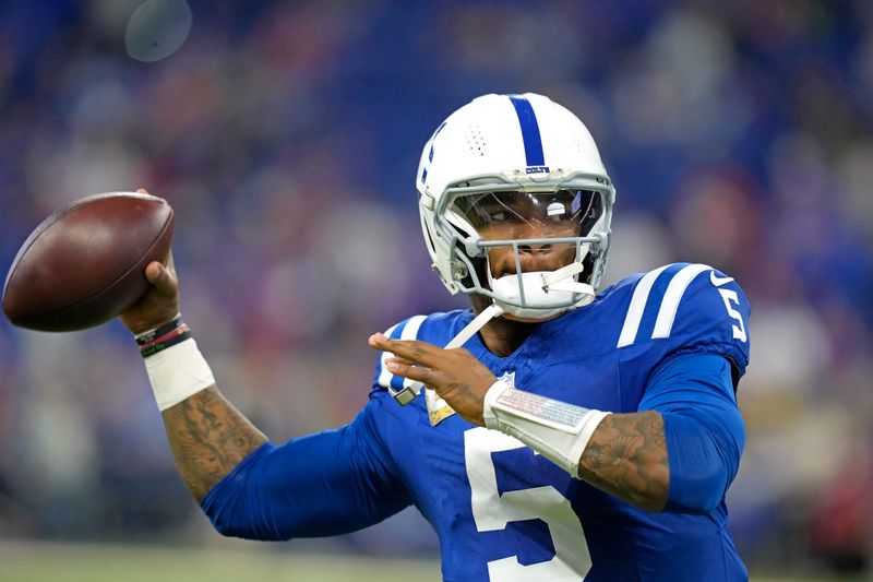 Indianapolis Colts quarterback Anthony Richardson (5) warms up before an NFL football game against the Buffalo Bills, Sunday, Nov. 10, 2024, in Indianapolis. (AP Photo/Darron Cummings)