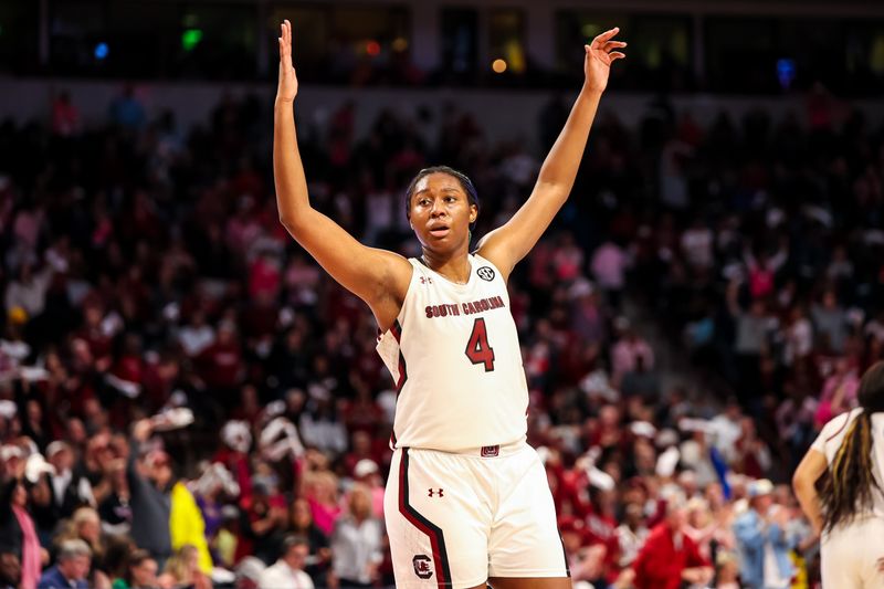 Feb 12, 2023; Columbia, South Carolina, USA; South Carolina Gamecocks forward Aliyah Boston (4) pumps up the crowd against the LSU Lady Tigers in the second half at Colonial Life Arena. Mandatory Credit: Jeff Blake-USA TODAY Sports