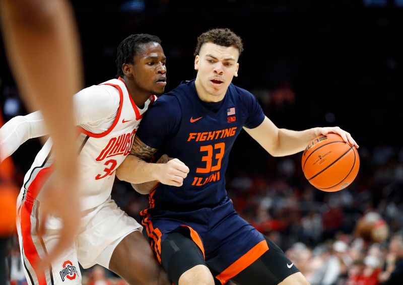 Feb 26, 2023; Columbus, Ohio, USA;  Illinois Fighting Illini forward Coleman Hawkins (33) controls the ball as Ohio State Buckeyes center Felix Okpara (34) defends during the first half at Value City Arena. Mandatory Credit: Joseph Maiorana-USA TODAY Sports