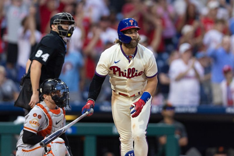 Aug 23, 2023; Philadelphia, Pennsylvania, USA; Philadelphia Phillies designated hitter Bryce Harper (3) hits a three RBI home run during the ninth inning against the San Francisco Giants at Citizens Bank Park. Mandatory Credit: Bill Streicher-USA TODAY Sports