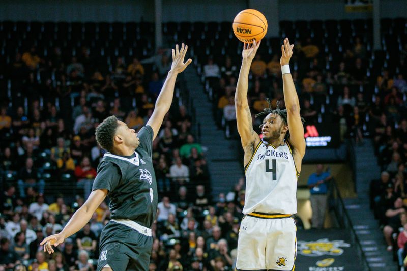 Mar 2, 2024; Wichita, Kansas, USA; Wichita State Shockers guard Colby Rogers (4) shoots the ball over Rice Owls guard Cameron Sheffield (5) during the first half at Charles Koch Arena. Mandatory Credit: William Purnell-USA TODAY Sports