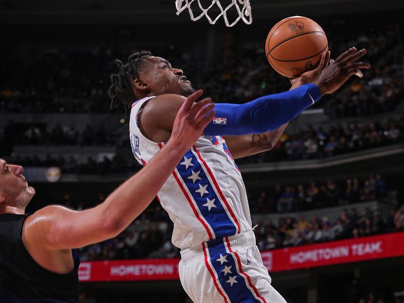 DENVER, CO - JANUARY 27: Danuel House Jr. #25 of the Philadelphia 76ers drives to the basket during the game against the Denver Nuggets on January 27, 2024 at the Ball Arena in Denver, Colorado. NOTE TO USER: User expressly acknowledges and agrees that, by downloading and/or using this Photograph, user is consenting to the terms and conditions of the Getty Images License Agreement. Mandatory Copyright Notice: Copyright 2024 NBAE (Photo by Bart Young/NBAE via Getty Images)