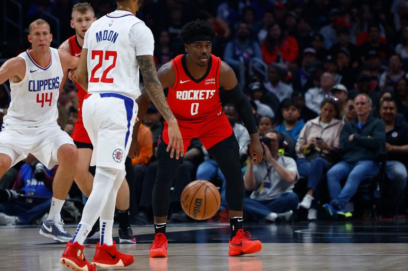 LOS ANGELES, CALIFORNIA - APRIL 14: Aaron Holiday #0 of the Houston Rockets in the first half at Crypto.com Arena on April 14, 2024 in Los Angeles, California.  NOTE TO USER: User expressly acknowledges and agrees that, by downloading and/or using this photograph, user is consenting to the terms and conditions of the Getty Images License Agreement.  (Photo by Ronald Martinez/Getty Images)