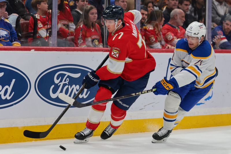 Feb 27, 2026; Sunrise, Florida, USA; Florida Panthers defenseman Niko Mikkola (77) moves the puck against Buffalo Sabres center Ryan McLeod (71) during the first period at Amerant Bank Arena. Mandatory Credit: Sam Navarro-Imagn Images