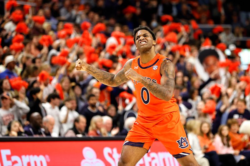 Nov 18, 2022; Auburn, Alabama, USA;  Auburn Tigers guard K.D. Johnson (0) reacts after a play against the Texas Southern Tigers during the second half at Neville Arena. Mandatory Credit: John Reed-USA TODAY Sports