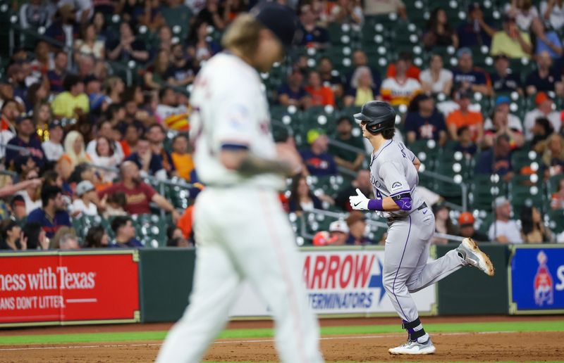 Jun 25, 2024; Houston, Texas, USA; Colorado Rockies first baseman Michael Toglia (4) rounds the bases after hitting a home run against Houston Astros relief pitcher Josh Hader (71) in the ninth inning at Minute Maid Park. Mandatory Credit: Thomas Shea-USA TODAY Sports