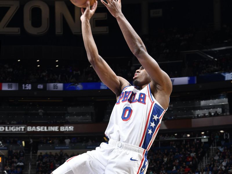 ORLANDO, FL - JANUARY 12: Tyrese Maxey #0 of the Philadelphia 76ers shoots the ball during the game against the Orlando Magic on January 12, 2025 at Kia Center in Orlando, Florida. NOTE TO USER: User expressly acknowledges and agrees that, by downloading and or using this photograph, User is consenting to the terms and conditions of the Getty Images License Agreement. Mandatory Copyright Notice: Copyright 2025 NBAE (Photo by Fernando Medina/NBAE via Getty Images)