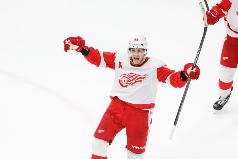 Feb 25, 2024; Chicago, Illinois, USA; Detroit Red Wings right wing Patrick Kane (88) celebrates after scoring game winning goal against the Chicago Blackhawks in overtime at United Center. Mandatory Credit: Kamil Krzaczynski-USA TODAY Sports