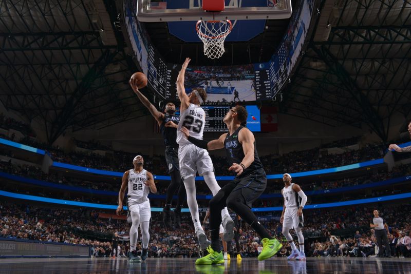 DALLAS, TX - FEBRUARY 14: Jaden Hardy #1 of the Dallas Mavericks drives to the basket during the game against the San Antonio Spurs on February 14, 2024 at the American Airlines Center in Dallas, Texas. NOTE TO USER: User expressly acknowledges and agrees that, by downloading and or using this photograph, User is consenting to the terms and conditions of the Getty Images License Agreement. Mandatory Copyright Notice: Copyright 2024 NBAE (Photo by Glenn James/NBAE via Getty Images)