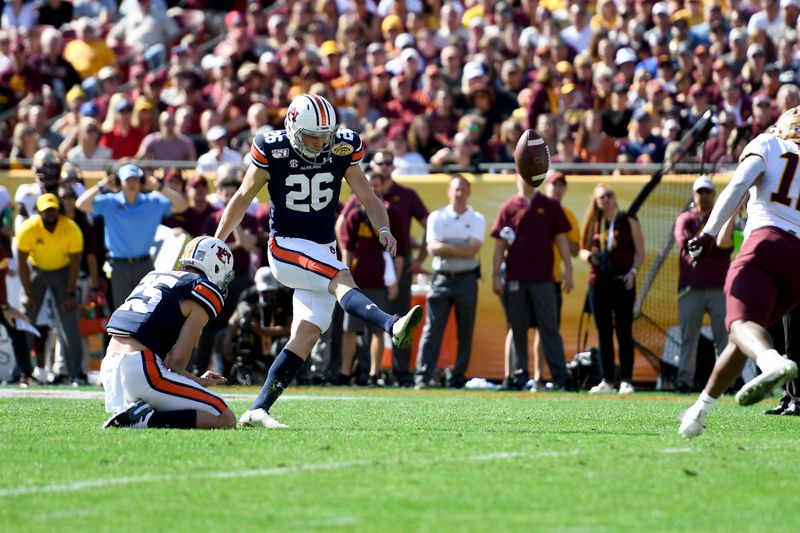 Jan 1, 2020; Tampa, Florida, USA; Auburn Tigers place kicker Anders Carlson (26) kicks a field goal during the first quarter against the Minnesota Golden Gophers at Raymond James Stadium. Mandatory Credit: Douglas DeFelice-USA TODAY Sports