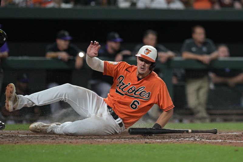 Aug 26, 2023; Baltimore, Maryland, USA;  Baltimore Orioles first baseman Ryan Mountcastle (6) scores in the seventh inning against the Colorado Rockies at Oriole Park at Camden Yards. Mandatory Credit: Tommy Gilligan-USA TODAY Sports