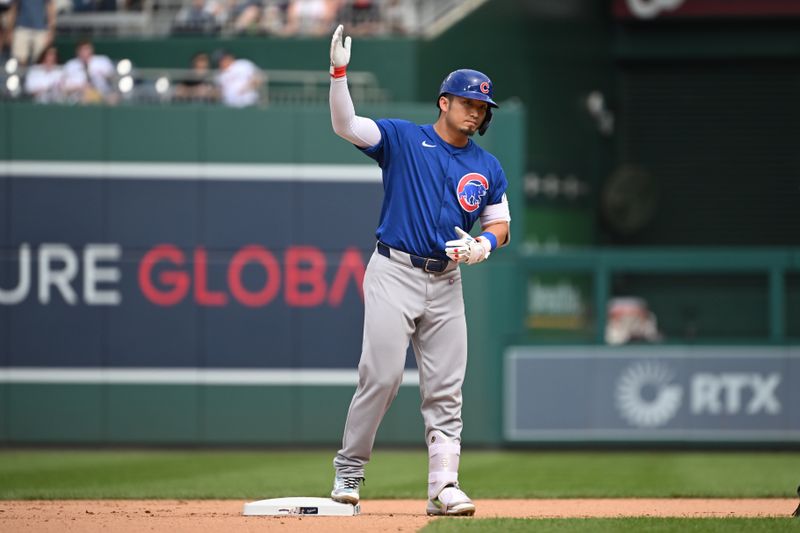 Sep 1, 2024; Washington, District of Columbia, USA; Chicago Cubs right fielder Seiya Suzuki (27) reacts after hitting a double against the Washington Nationals during the seventh inning at Nationals Park. Mandatory Credit: Rafael Suanes-USA TODAY Sports