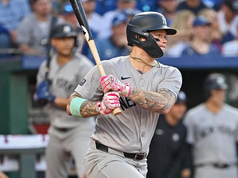 Jun 11, 2024; Kansas City, Missouri, USA; New York Yankees left fielder Alex Verdugo (24) singles in the fourth inning against the Kansas City Royals at Kauffman Stadium. Mandatory Credit: Peter Aiken-USA TODAY Sports