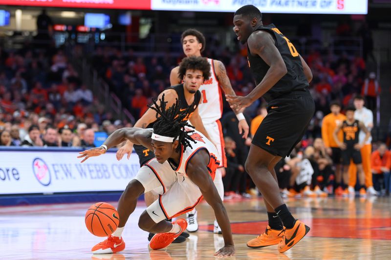 Dec 2, 2025; Syracuse, New York, USA; Syracuse Orange forward William Kyle III (42) reacts to a loose ball as Tennessee Volunteers forward Dewayne Brown II (6) defends during the second half at the JMA Wireless Dome. Mandatory Credit: Rich Barnes-Imagn Images