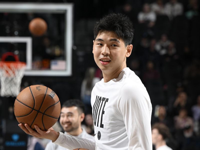 BROOKLYN, NY - NOVEMBER 4: Cui Yongxi #8 of the Brooklyn Nets warms up before the game against the Memphis Grizzlies on November 4, 2024 at Barclays Center in Brooklyn, New York. NOTE TO USER: User expressly acknowledges and agrees that, by downloading and or using this Photograph, user is consenting to the terms and conditions of the Getty Images License Agreement. Mandatory Copyright Notice: Copyright 2024 NBAE (Photo by David Dow<p><br/></p>/NBAE via Getty Images)