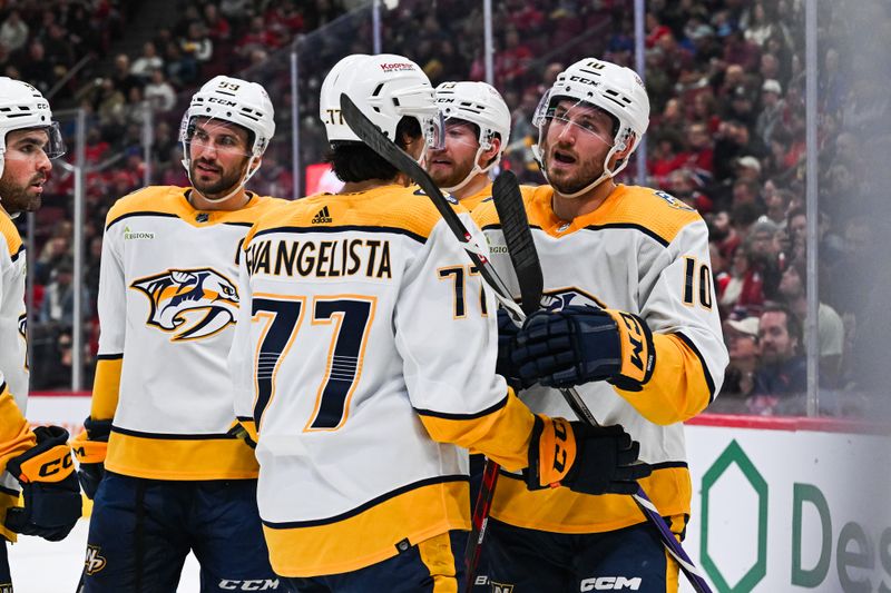 Dec 10, 2023; Montreal, Quebec, CAN; Nashville Predators center Colton Sissons (10) celebrates his goal against the Montreal Canadiens with his teammates during the second period at Bell Centre. Mandatory Credit: David Kirouac-USA TODAY Sports