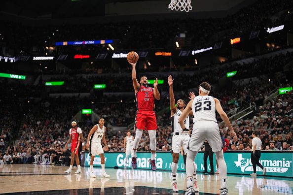 SAN ANTONIO, TX - DECEMBER 17: CJ McCollum #3 of the New Orleans Pelicans shoots the ball during the game against the San Antonio Spurs on December 17, 2023 at the Frost Bank Center in San Antonio, Texas. NOTE TO USER: User expressly acknowledges and agrees that, by downloading and or using this photograph, user is consenting to the terms and conditions of the Getty Images License Agreement. Mandatory Copyright Notice: Copyright 2023 NBAE (Photos by Darren Carroll/NBAE via Getty Images)