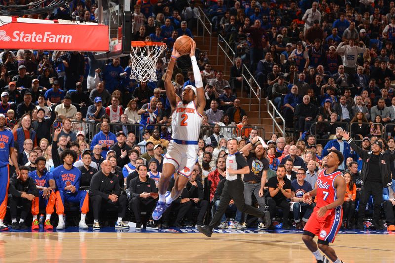 NEW YORK, NY - APRIL 20: Miles McBride #2 of the New York Knicks dunks the ball during the game against the Philadelphia 76ers during Round 1 Game 1 of the 2024 NBA Playoffs on April 20, 2024 at Madison Square Garden in New York City, New York.  NOTE TO USER: User expressly acknowledges and agrees that, by downloading and or using this photograph, User is consenting to the terms and conditions of the Getty Images License Agreement. Mandatory Copyright Notice: Copyright 2024 NBAE  (Photo Jesse D. Garrabrant/NBAE via Getty Images)