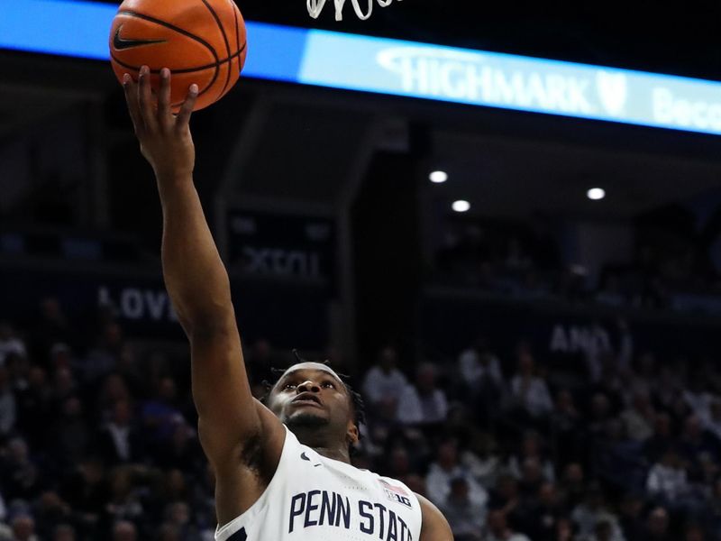 Feb 8, 2024; University Park, Pennsylvania, USA; Penn State Nittany Lions guard Kanye Clary (0) drives the ball to the basket on a break away during the first half against the Iowa Hawkeyes at Bryce Jordan Center. Penn State defeated Iowa 89-79. Mandatory Credit: Matthew O'Haren-USA TODAY Sports