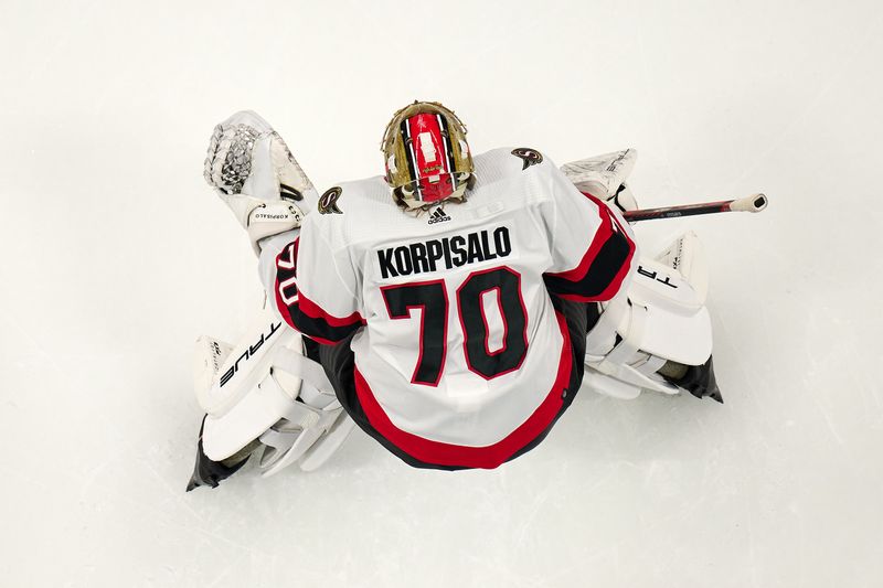 Mar 9, 2024; San Jose, California, USA; Ottawa Senators goaltender Joonas Korpisalo (70) warms up before the game between the San Jose Sharks and the Ottawa Senators at SAP Center at San Jose. Mandatory Credit: Robert Edwards-USA TODAY Sports