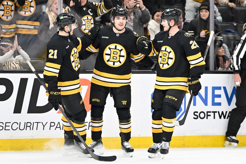 Dec 16, 2025; Boston, Massachusetts, USA; Boston Bruins center Michael Eyssimont (81) celebrates his goal with center Alex Steeves (21) and defenseman Victor Soderstrom (29) during the third period against the Utah Mammoth at TD Garden. Mandatory Credit: Eric Canha-Imagn Images