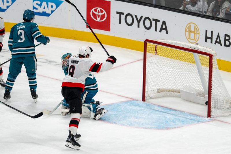 Nov 27, 2024; San Jose, California, USA; Ottawa Senators center Josh Norris (9) celebrates after the score against the San Jose Sharks during the second period at SAP Center at San Jose. Mandatory Credit: Neville E. Guard-Imagn Images