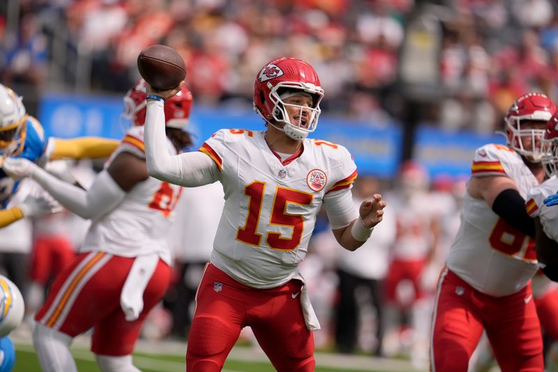 Kansas City Chiefs quarterback Patrick Mahomes throws during the first half of an NFL football game against the Los Angeles Chargers Sunday, Sept. 29, 2024, in Inglewood, Calif. (AP Photo/Marcio Jose Sanchez)