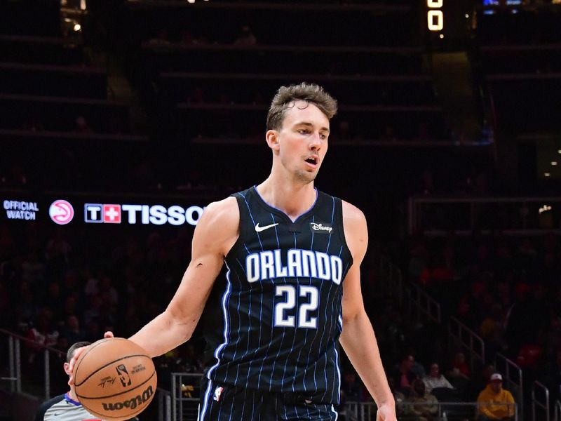 ATLANTA, GA - FEBRUARY 25: Franz Wagner #22 of the Orlando Magic dribbles the ball during the game against the Atlanta Hawks on February 25, 2024 at State Farm Arena in Atlanta, Georgia.  NOTE TO USER: User expressly acknowledges and agrees that, by downloading and/or using this Photograph, user is consenting to the terms and conditions of the Getty Images License Agreement. Mandatory Copyright Notice: Copyright 2024 NBAE (Photo by Scott Cunningham/NBAE via Getty Images)