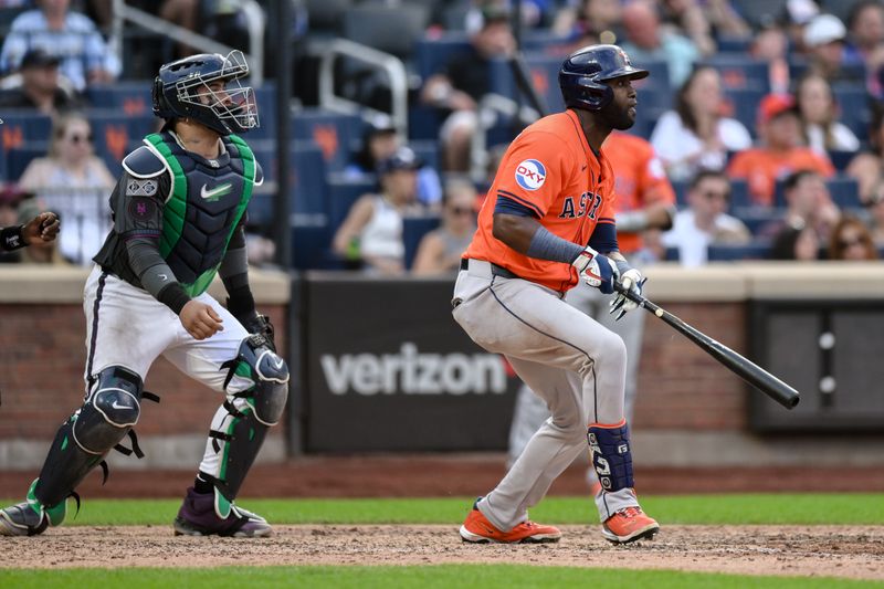 Jun 29, 2024; New York City, New York, USA; Houston Astros outfielder Yordan Alvarez (44) hits a single against the New York Mets during the seventh inning at Citi Field. Mandatory Credit: John Jones-USA TODAY Sports