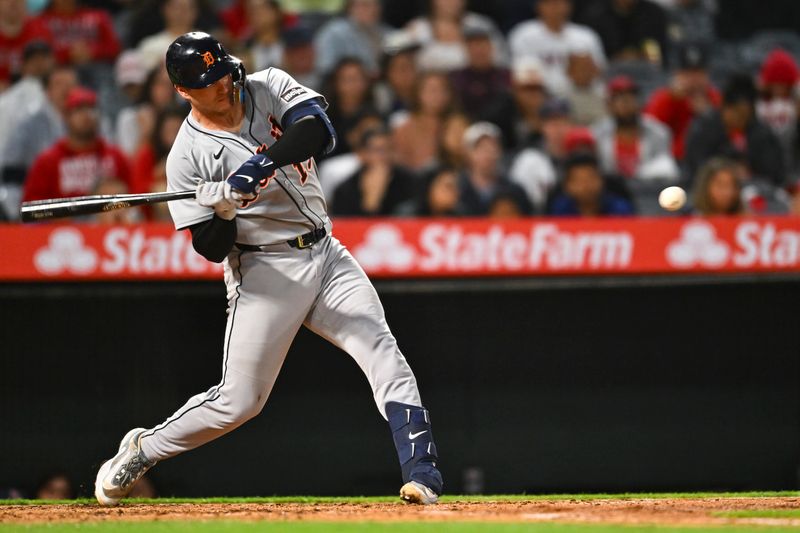 May 3, 2025; Anaheim, California, USA; Detroit Tigers catcher Dillon Dingler (13) singles against the Los Angeles Angels during the sixth inning at Angel Stadium. Mandatory Credit: Jonathan Hui-Imagn Images