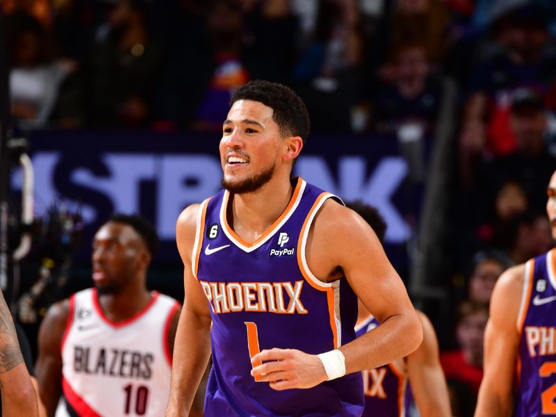 PHOENIX, AZ - NOVEMBER 5: Devin Booker #1 of the Phoenix Suns looks on during the game against the Portland Trail Blazers on November 5, 2022 at Footprint Center in Phoenix, Arizona. NOTE TO USER: User expressly acknowledges and agrees that, by downloading and or using this photograph, user is consenting to the terms and conditions of the Getty Images License Agreement. Mandatory Copyright Notice: Copyright 2022 NBAE (Photo by Barry Gossage/NBAE via Getty Images)